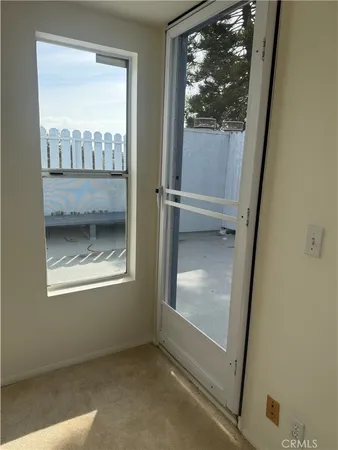 a view of a hallway with entryway