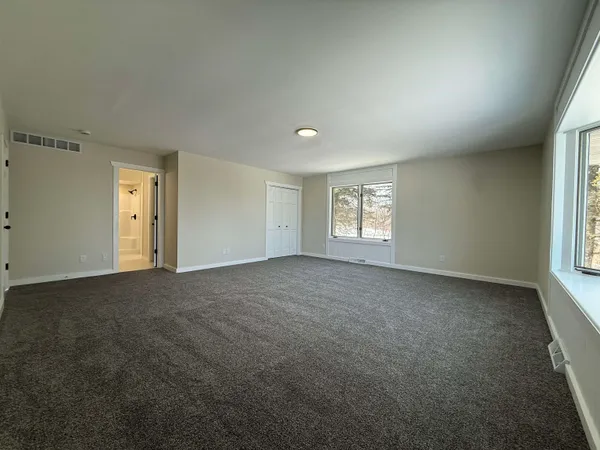 an empty room with windows
