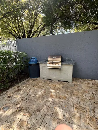 a view of a kid room with a bench and wooden fence