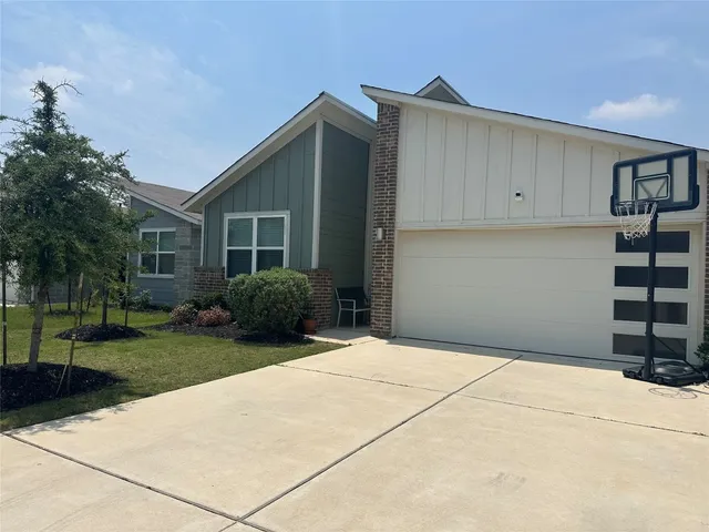 a house view with a backyard