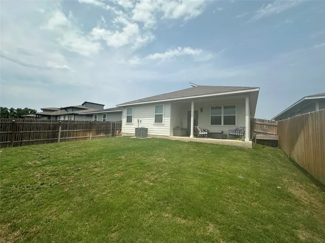 a view of a backyard with a garden