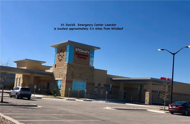 a view of a building with a street