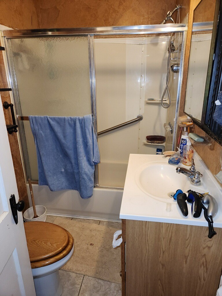 419 Fifth Street McLean, TX 79057 - Photo 20 of 34 a bathroom with a sink and a mirror