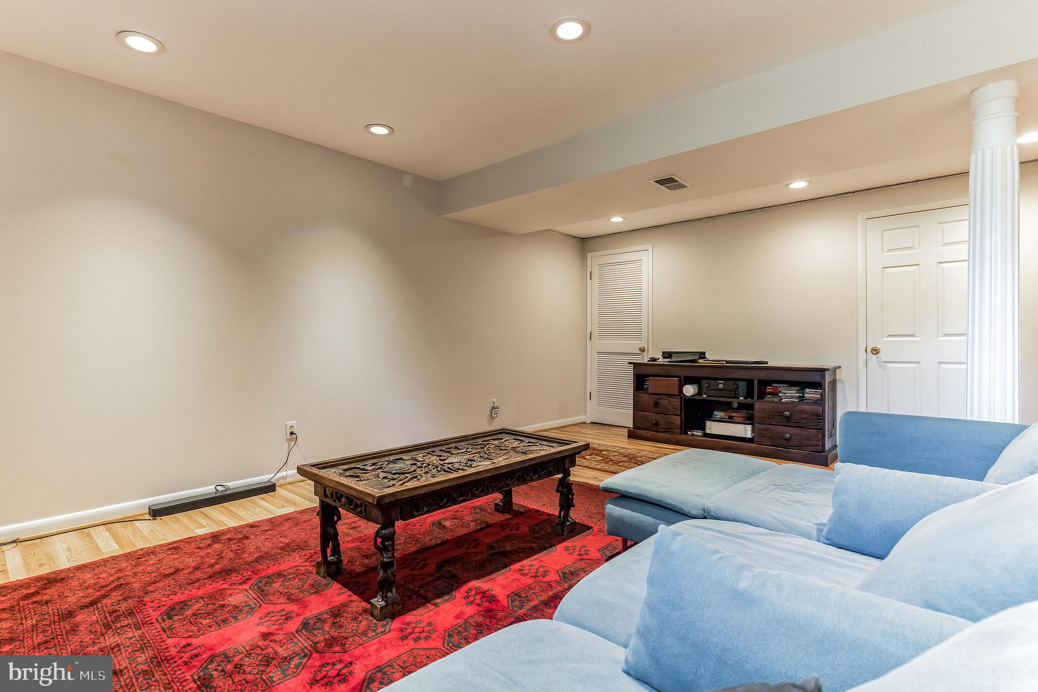 9329 Harvey Road Silver Spring, MD 20910 - Photo 25 of 40 a living room with furniture and a wooden floor