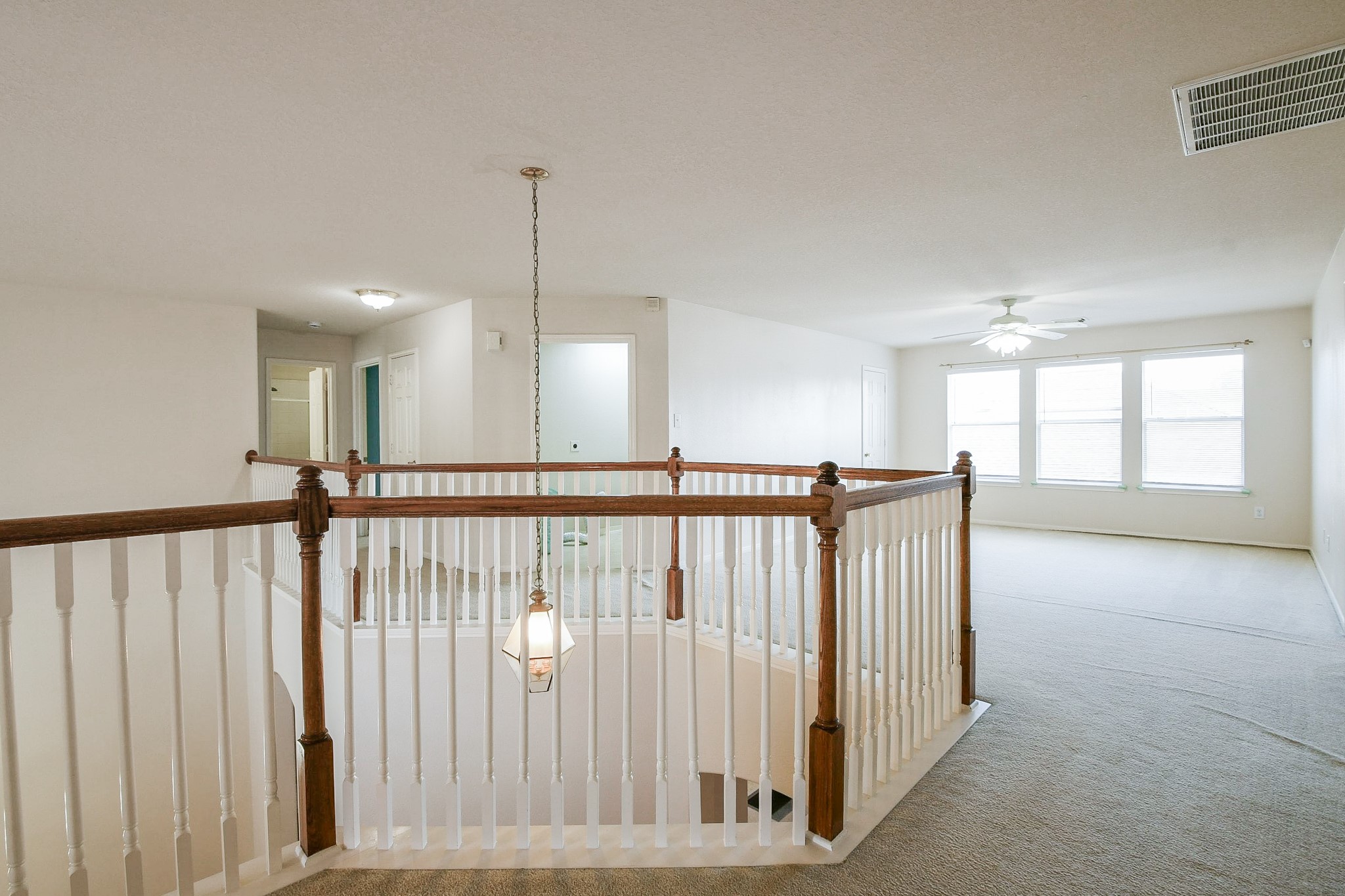 24219 Camillia Ridge Way Katy, TX 77493 - Photo 19 of 32 a view of a hallway with windows