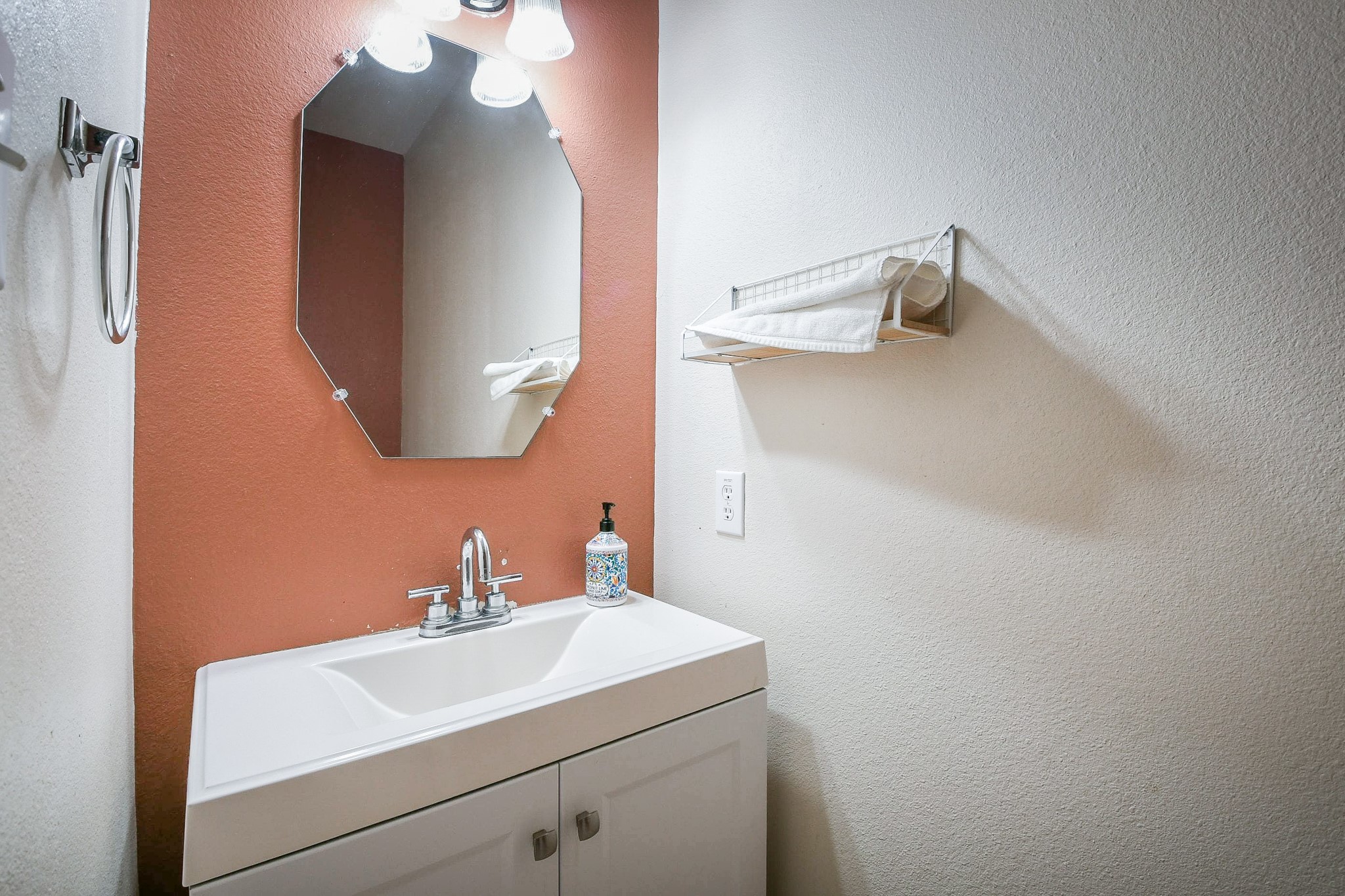 24219 Camillia Ridge Way Katy, TX 77493 - Photo 26 of 32 a bathroom with a sink and a mirror