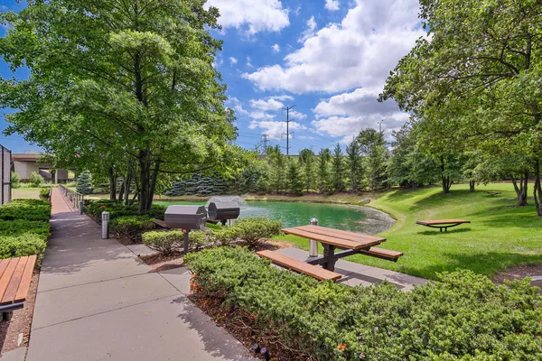a view of a lake with a yard
