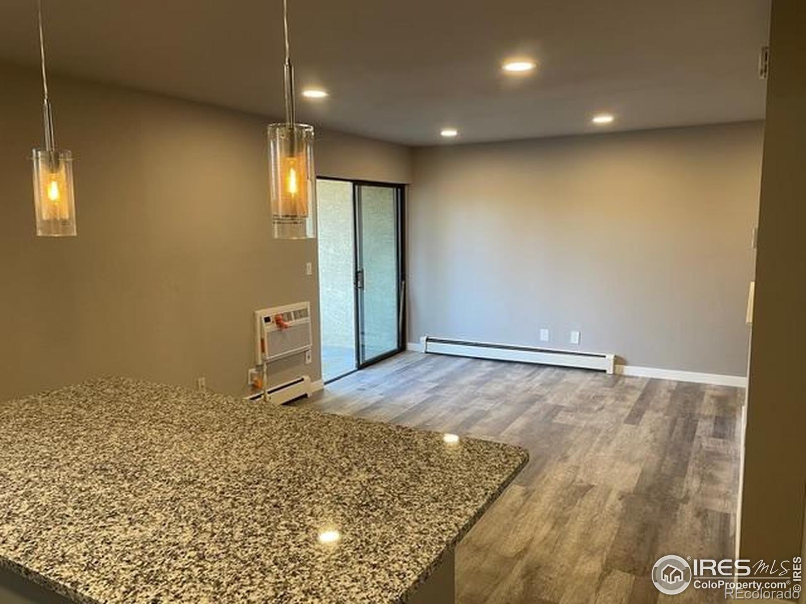 3035 Oneal Parkway, Unit T11 Boulder, CO 80301 - Photo 6 of 28 a view of a livingroom with a rug