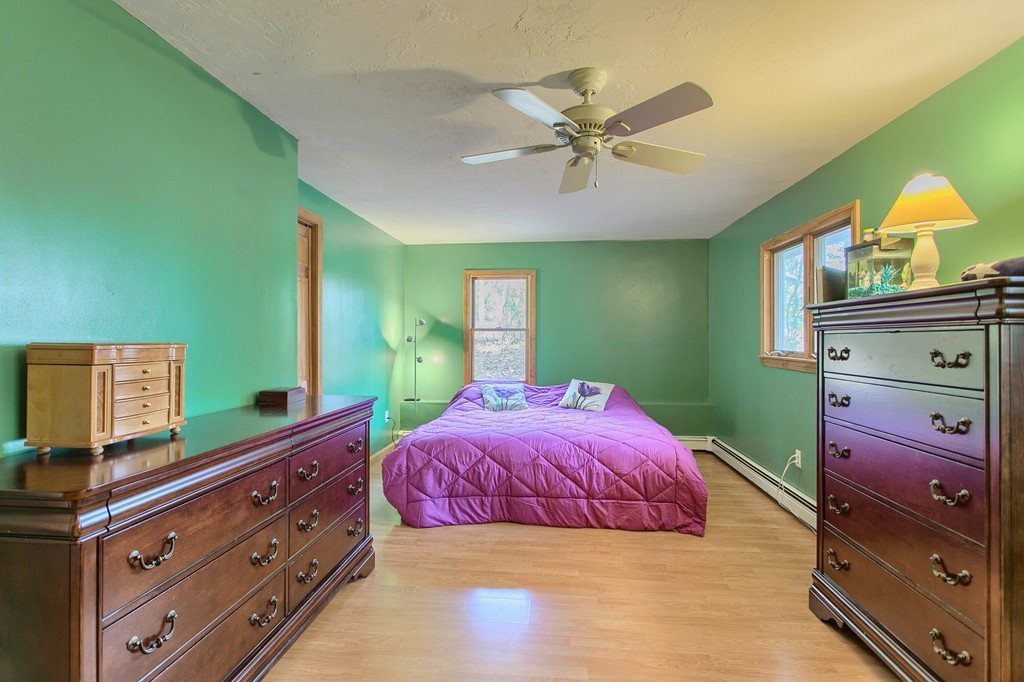 49 Clarissa Road Chelmsford, MA 01824 - Photo 11 of 25 a bedroom with a bed and a dresser