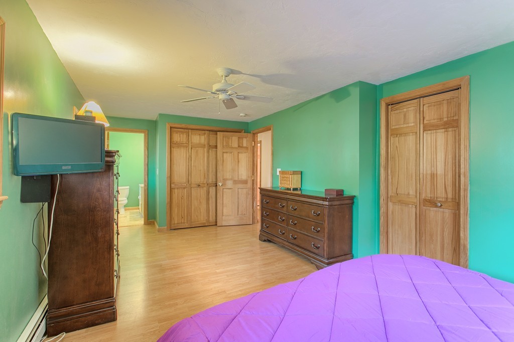 49 Clarissa Road Chelmsford, MA 01824 - Photo 14 of 25 a bedroom with a bed and a dresser