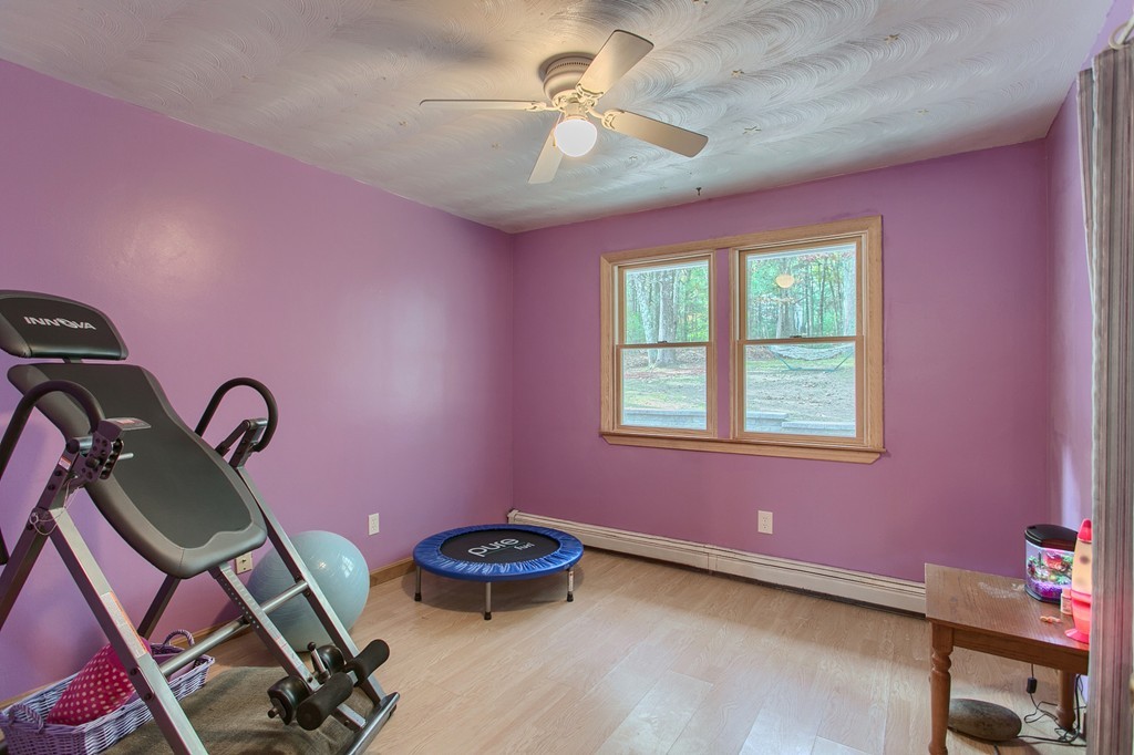 49 Clarissa Road Chelmsford, MA 01824 - Photo 15 of 25 a view of a room with gym equipment