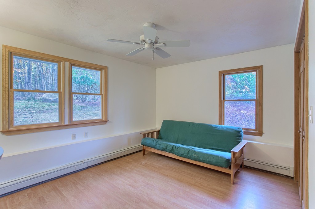 49 Clarissa Road Chelmsford, MA 01824 - Photo 16 of 25 a room with a window and wooden floor