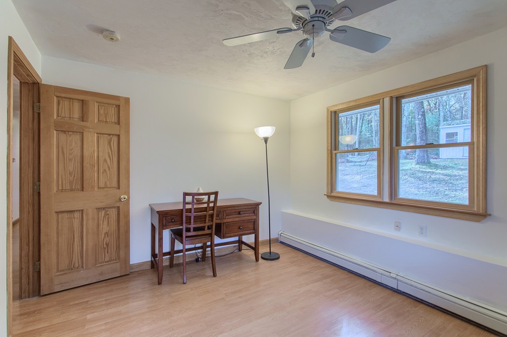 49 Clarissa Road Chelmsford, MA 01824 - Photo 17 of 25 a view of a workspace with furniture and a window