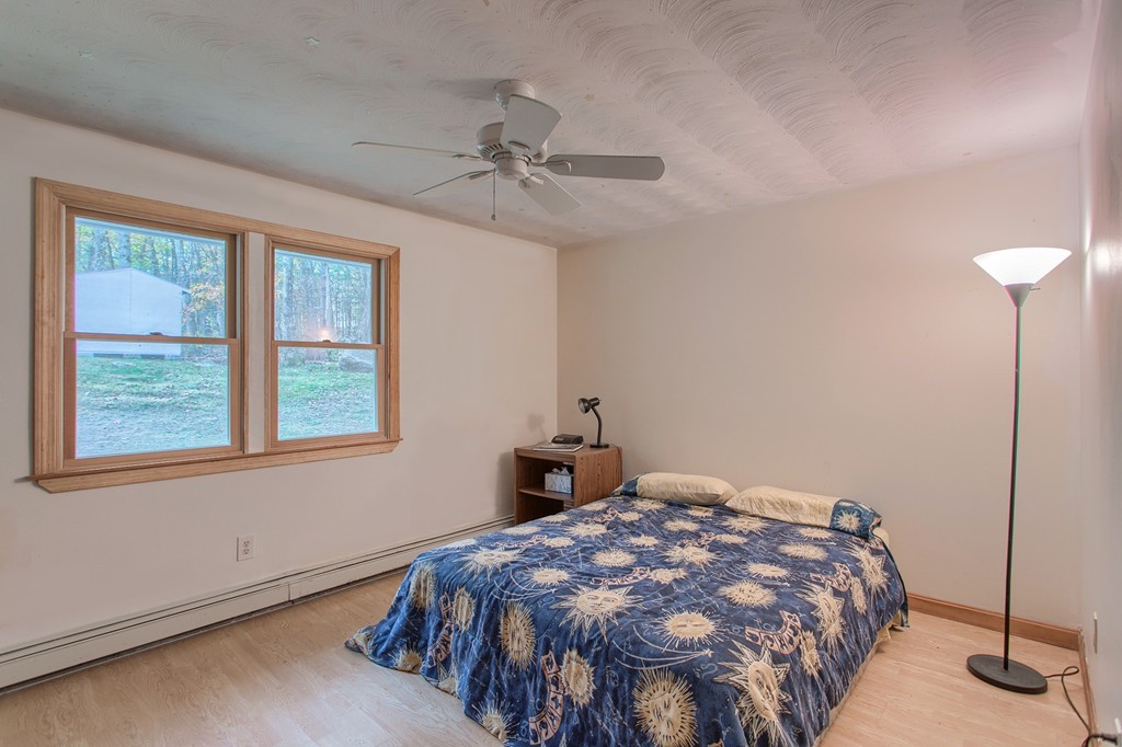 49 Clarissa Road Chelmsford, MA 01824 - Photo 18 of 25 a bedroom with a bed and window