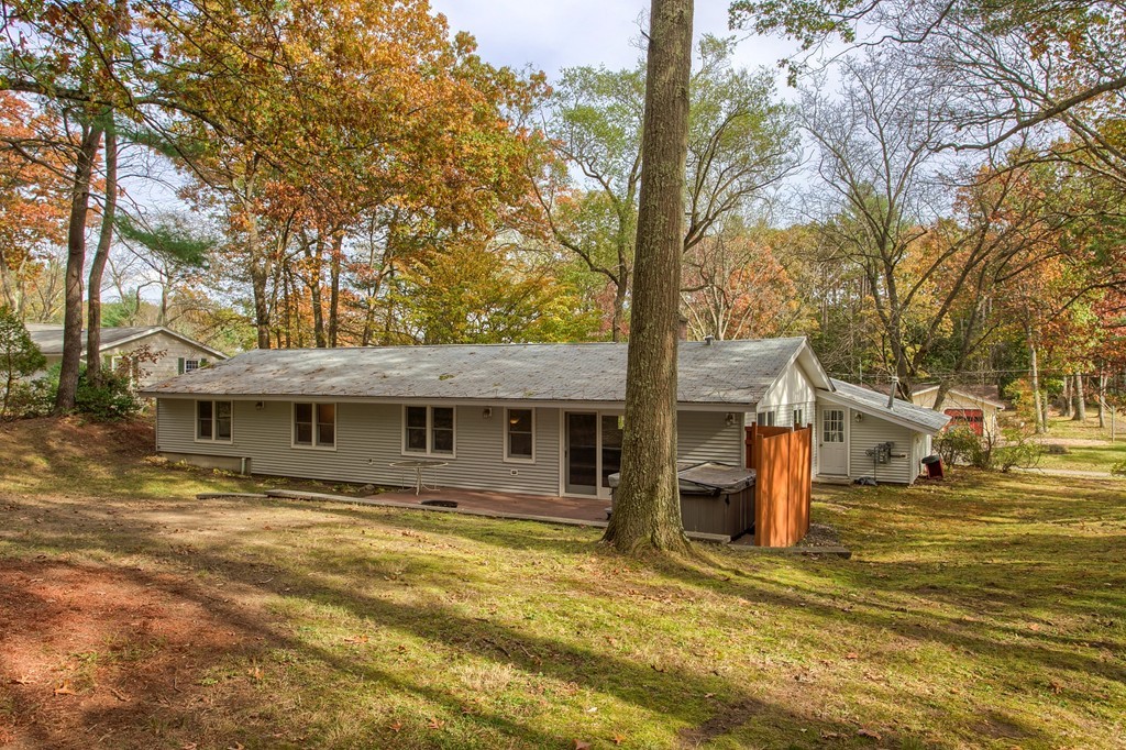 49 Clarissa Road Chelmsford, MA 01824 - Photo 23 of 25 a front view of a house with a yard