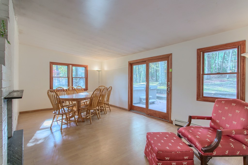 49 Clarissa Road Chelmsford, MA 01824 - Photo 3 of 25 a dining room with furniture and wooden floor