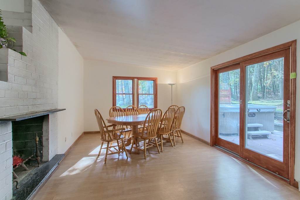 49 Clarissa Road Chelmsford, MA 01824 - Photo 4 of 25 a view of a dining room with furniture window and outside view