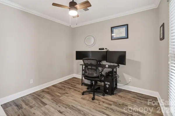a workspace with wooden floor
