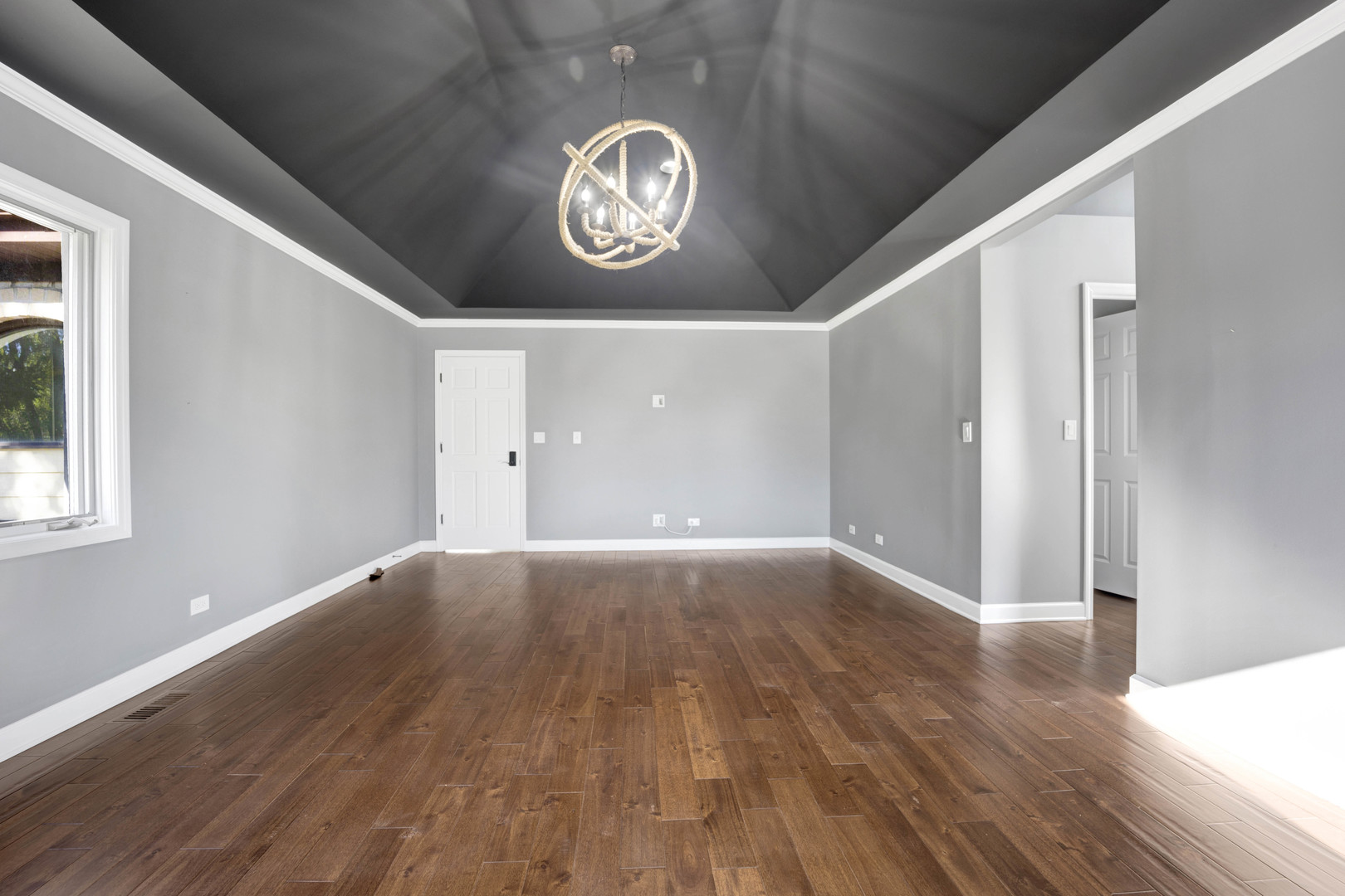 4N891 Honey Hill Circle Wayne, IL 60184 - Photo 26 of 57 a view of an empty room with wooden floor and a window