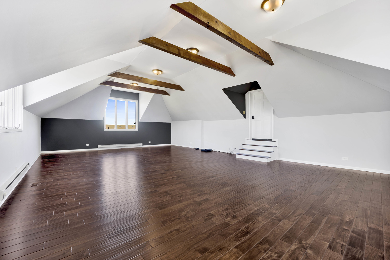 4N891 Honey Hill Circle Wayne, IL 60184 - Photo 40 of 57 a view of a livingroom with wooden floor and a ceiling fan