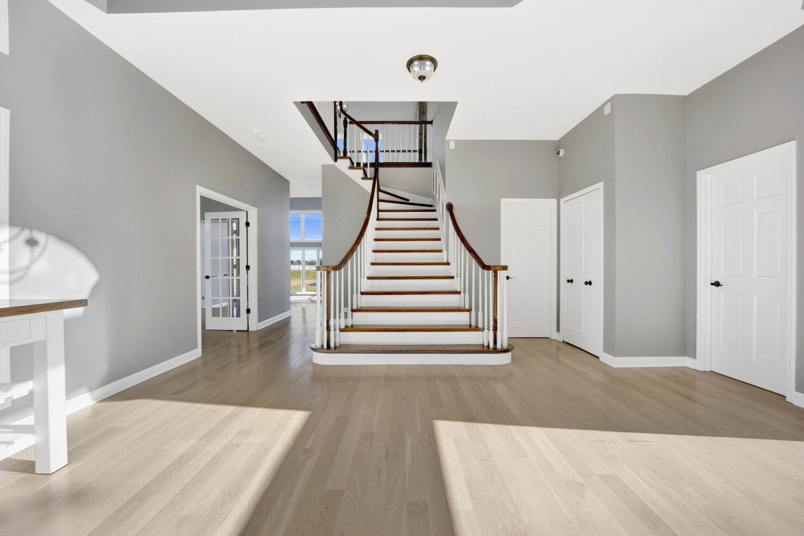 4N891 Honey Hill Circle Wayne, IL 60184 - Photo 6 of 57 a view of a room with wooden floor and stairs