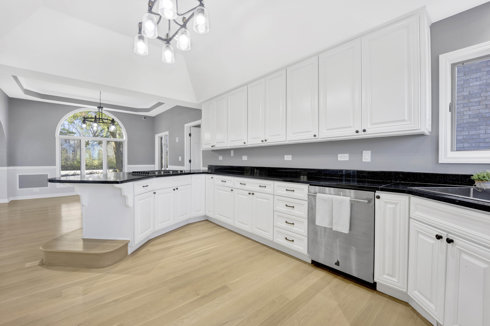 4N891 Honey Hill Circle Wayne, IL 60184 - Photo 10 of 57 a kitchen with granite countertop white cabinets and white appliances
