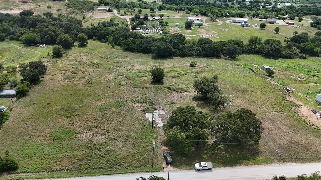 497 Big Sandy Road Newcastle, TX 76372 - Photo 9 of 22 Expansive undeveloped lot featuring varied topography and established trees