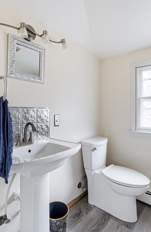 85 Campbell Street Rutland, MA 01543 - Photo 23 of 32 a bathroom with a toilet sink and mirror