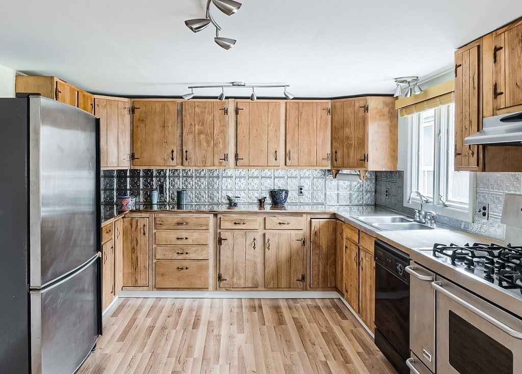 85 Campbell Street Rutland, MA 01543 - Photo 4 of 32 a kitchen with stainless steel appliances a stove sink and refrigerator
