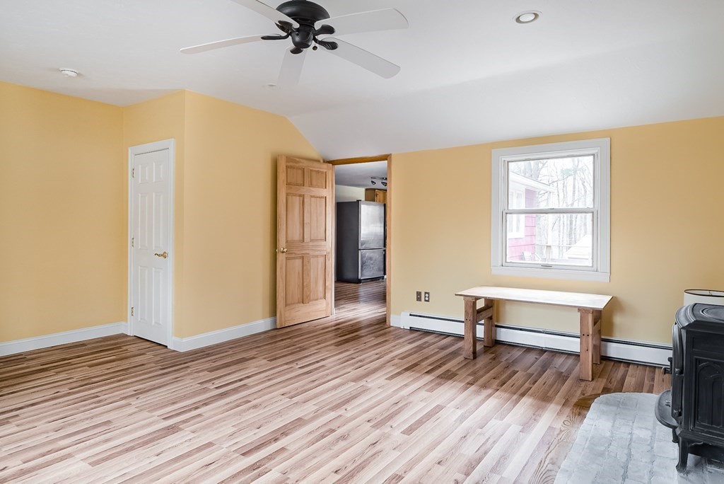85 Campbell Street Rutland, MA 01543 - Photo 8 of 32 a view of a room with furniture and wooden floor