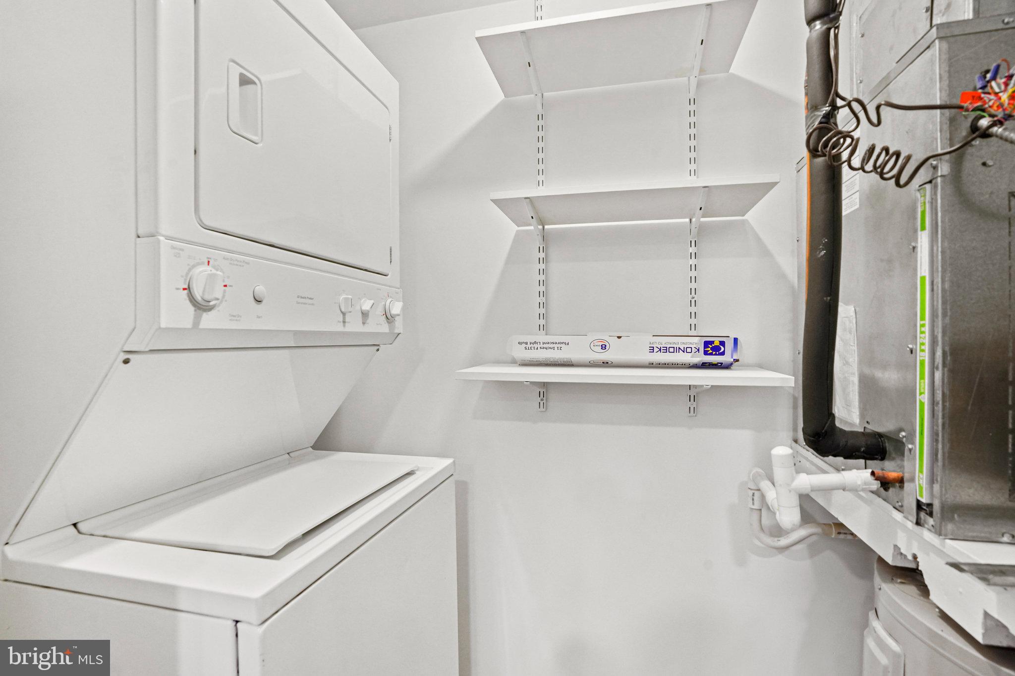 2627 Adams Mill Road Northwest, Unit T3 Washington, DC 20009 - Photo 18 of 19 a bathroom with a sink and a mirror
