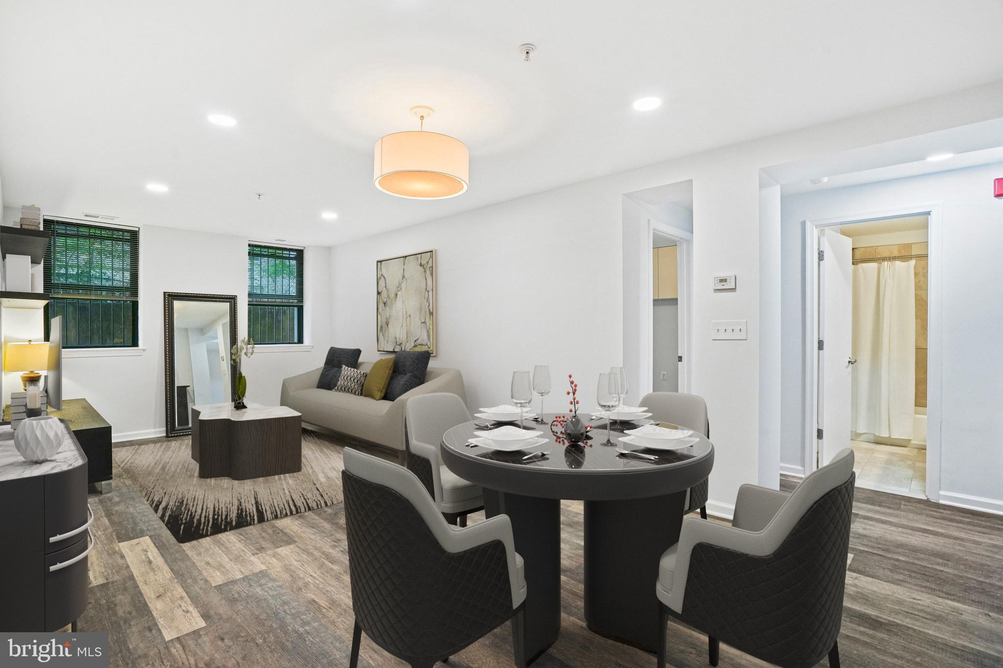2627 Adams Mill Road Northwest, Unit T3 Washington, DC 20009 - Photo 7 of 19 a view of a dining room with furniture and wooden floor
