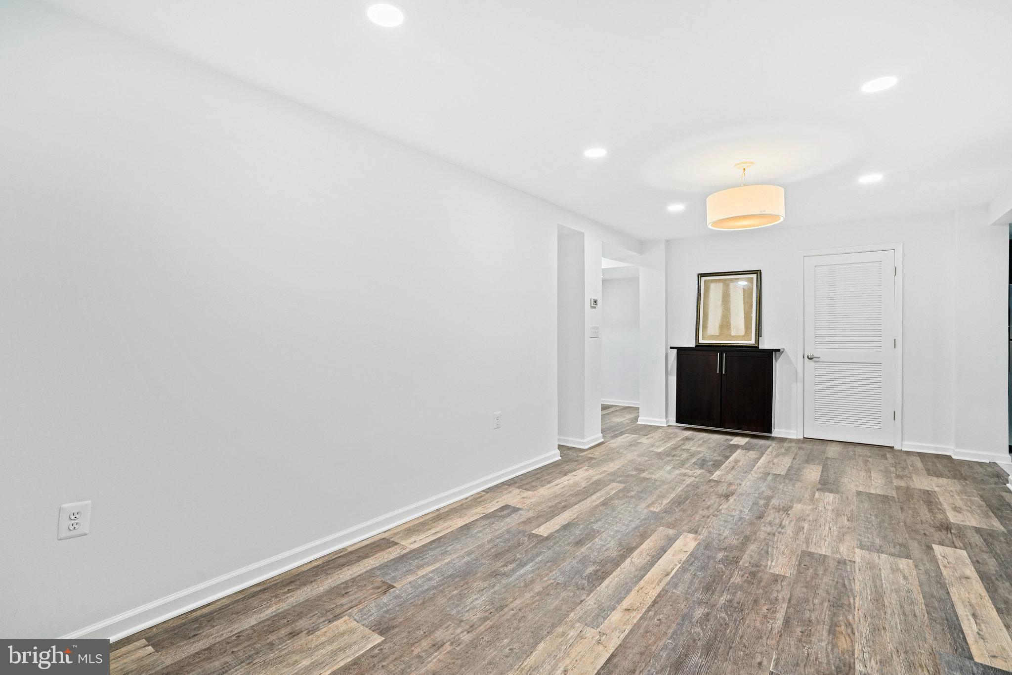 2627 Adams Mill Road Northwest, Unit T3 Washington, DC 20009 - Photo 8 of 19 a view of empty room with wooden floor