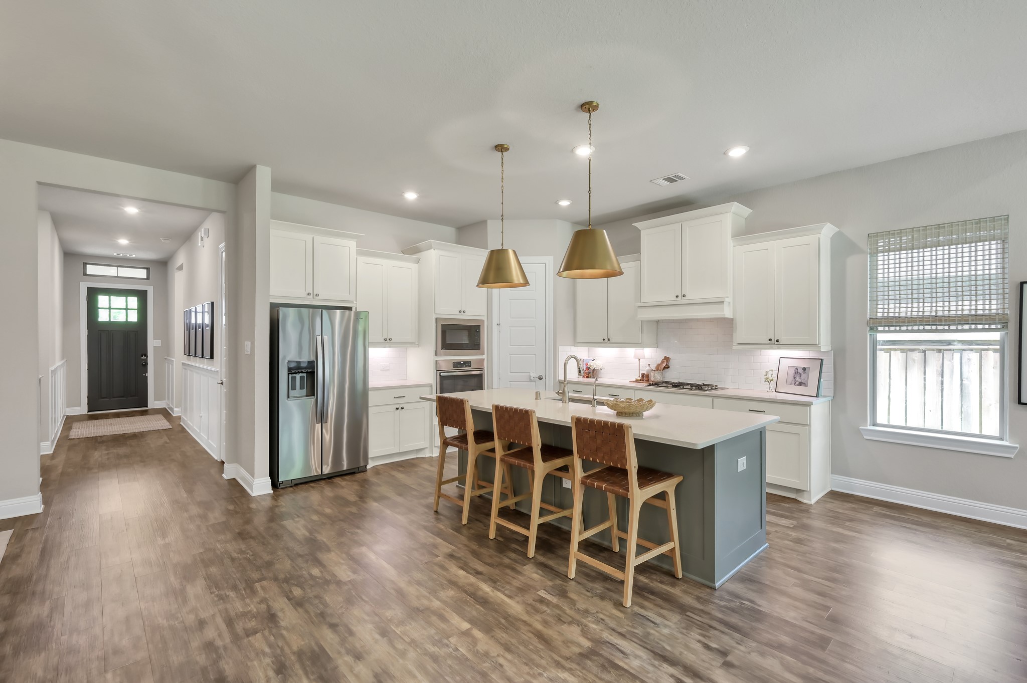 4273 Grand Oaks Wind Spring, TX 77386 - Photo 11 of 39 Timeless kitchen design featuring granite countertops, spacious island, oversized stainless steel sink and gas range cooktop