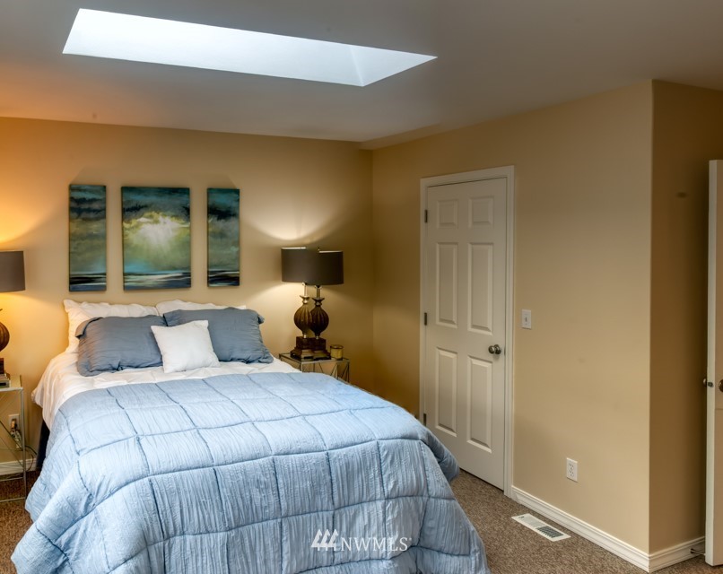 2731 Diamond Loop Milton, WA 98354 - Photo 17 of 28 a bedroom with a bed and window