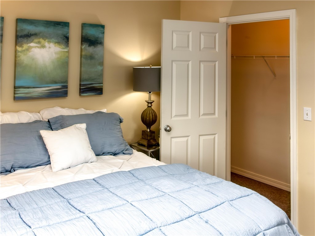 2731 Diamond Loop Milton, WA 98354 - Photo 20 of 28 a bedroom with a bed and a mirror