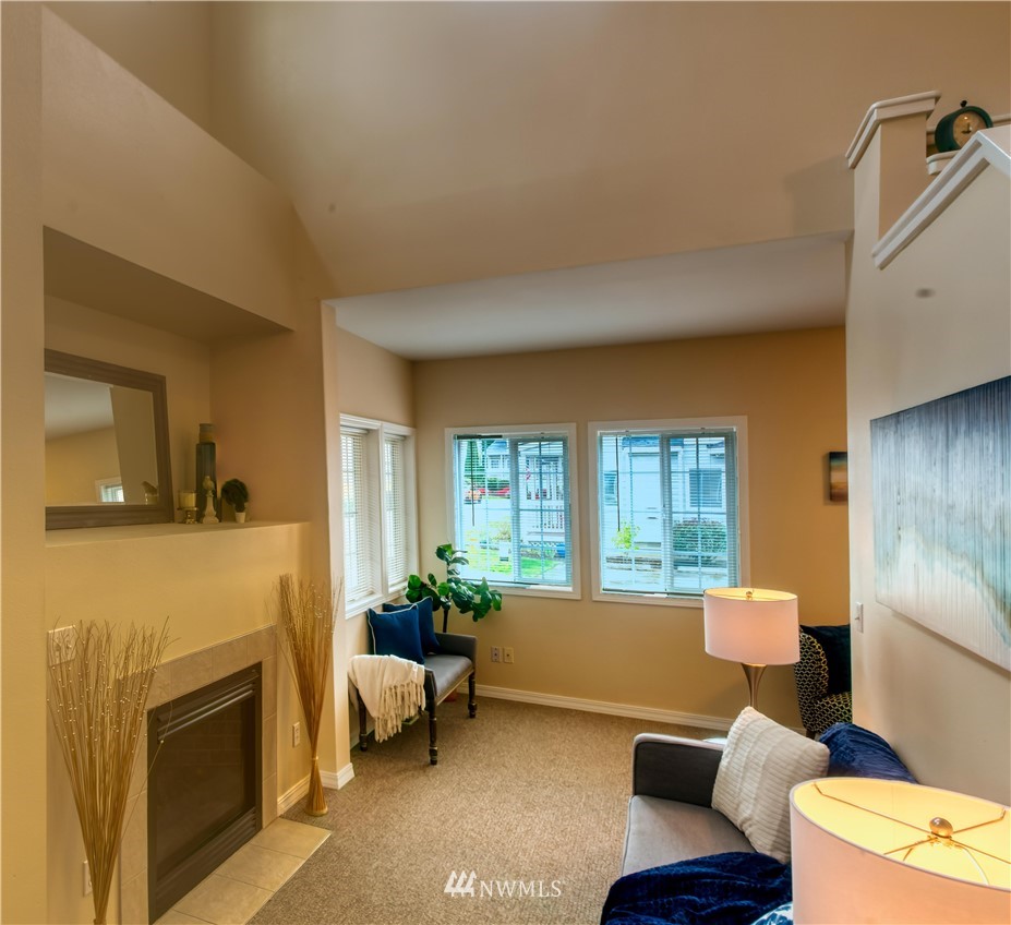 2731 Diamond Loop Milton, WA 98354 - Photo 8 of 28 a bathroom with a toilet sink and mirror