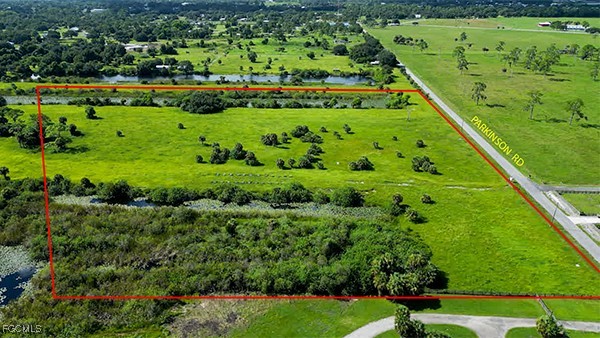 18030 Parkinson Road Alva, FL 33920 - Photo 2 of 8 a view of a large garden