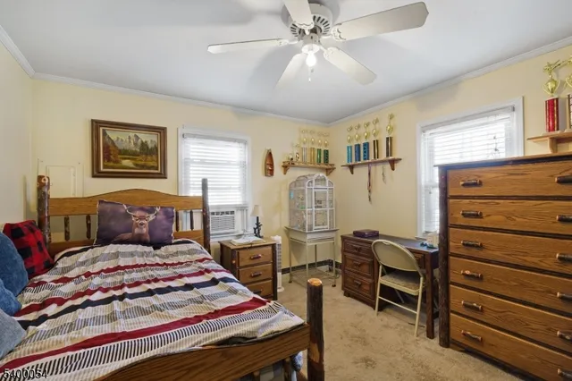 a bedroom with a bed and furniture