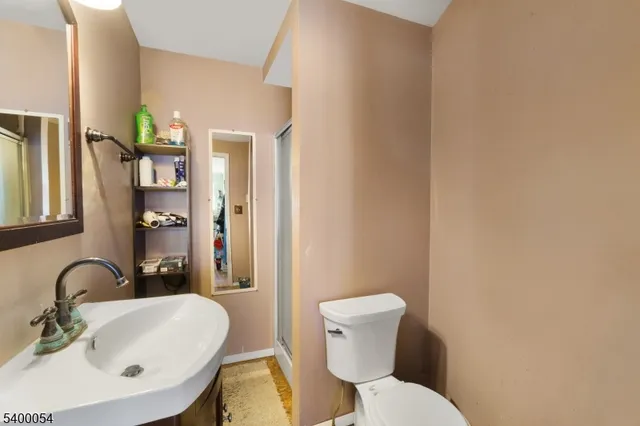 a bathroom with a sink and a toilet