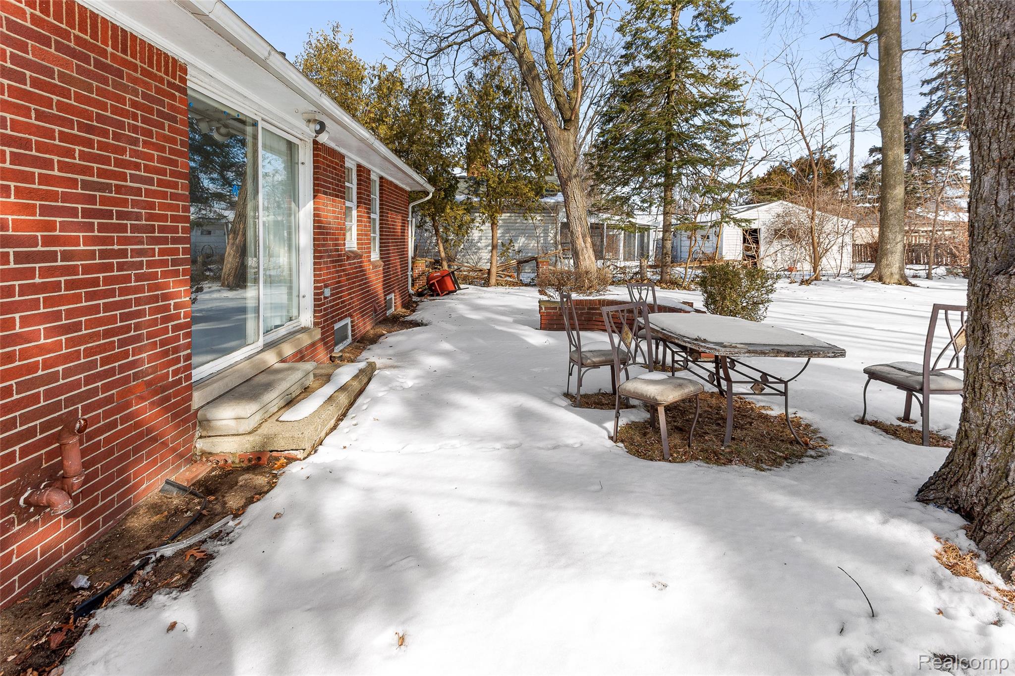 1830 North Gulley Road Dearborn, MI 48128 - Photo 20 of 29 Snow covered patio with entry steps