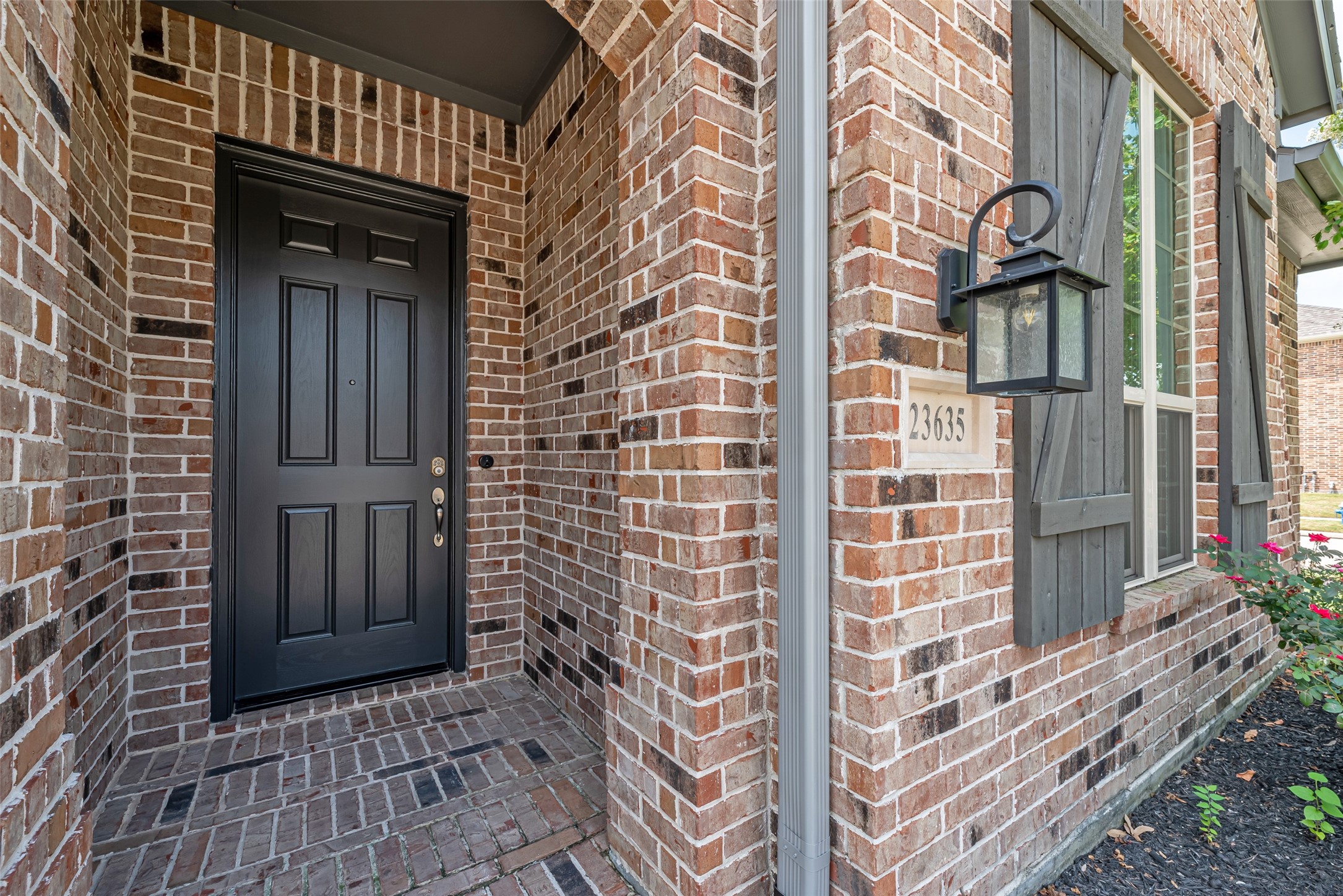23635 Kingston Ridge Way Katy, TX 77493 - Photo 3 of 36 Charming brick entryway