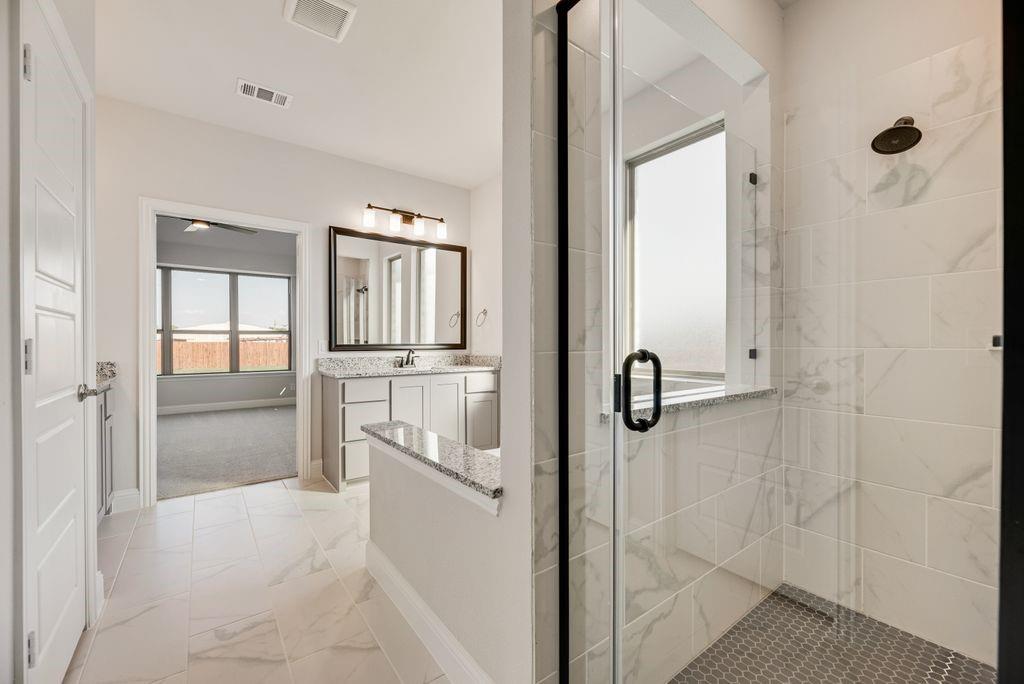 597 MB's Way Pilot Point, TX 76258 - Photo 25 of 34 a bathroom with a shower