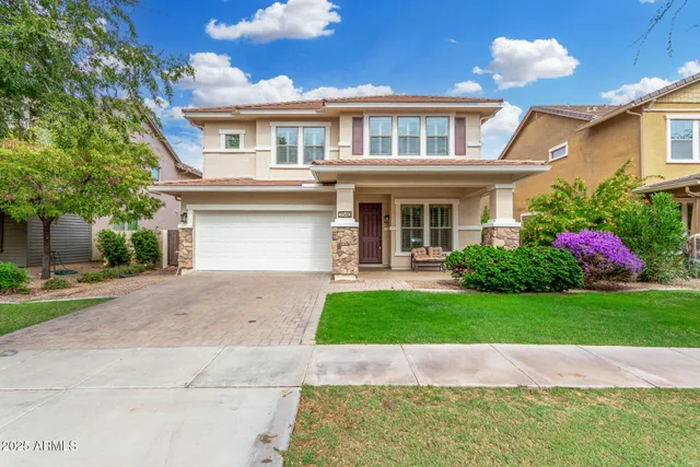 a house view with a garden space