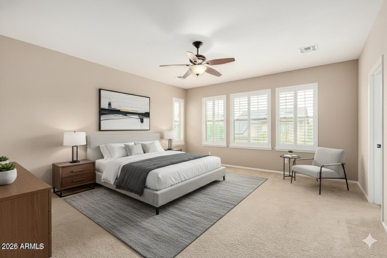 3540 East Mesquite Street Gilbert, AZ 85296 - Photo 29 of 55 a spacious bedroom with a large bed couch and two windows