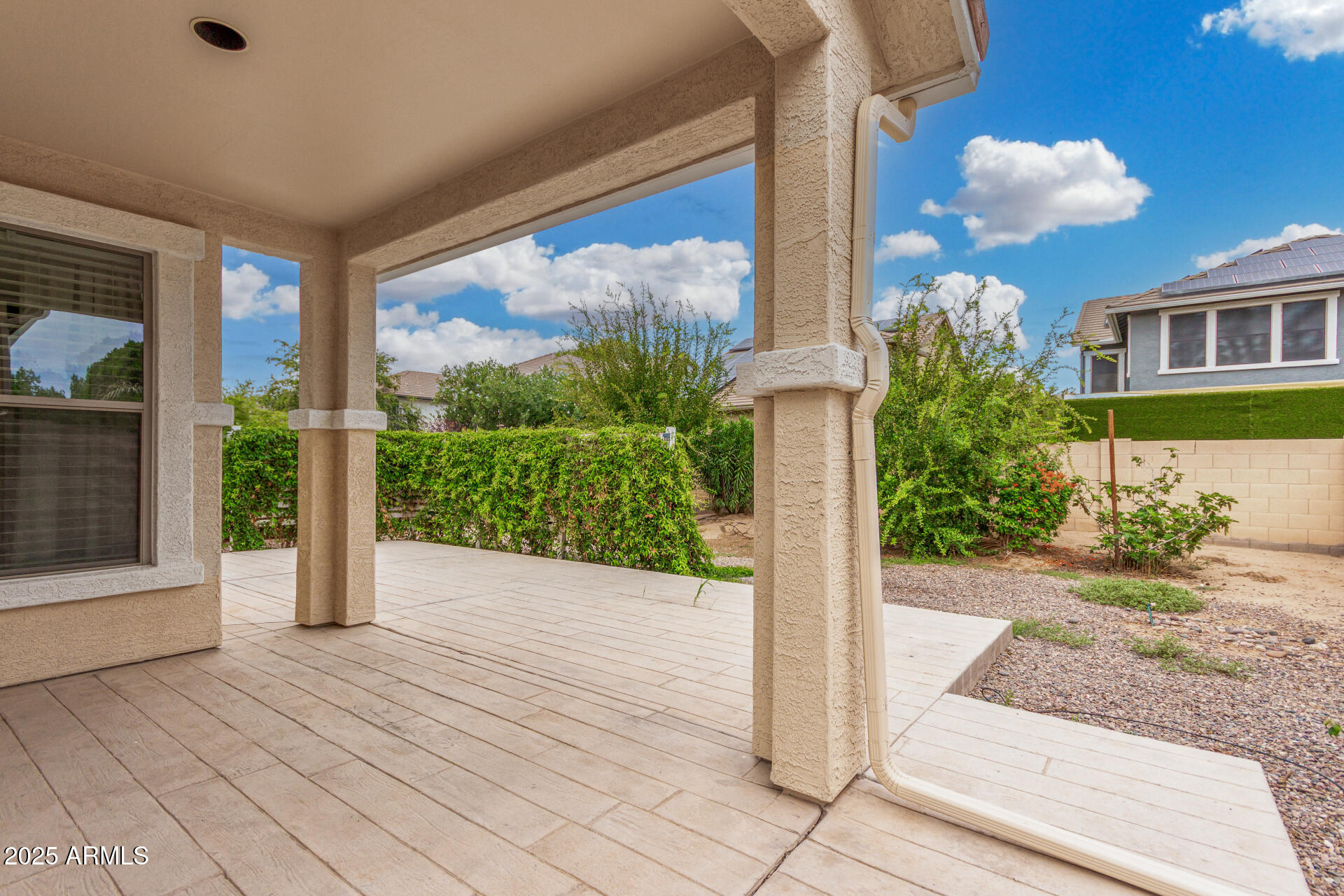3540 East Mesquite Street Gilbert, AZ 85296 - Photo 50 of 55 a front view of a house with garden