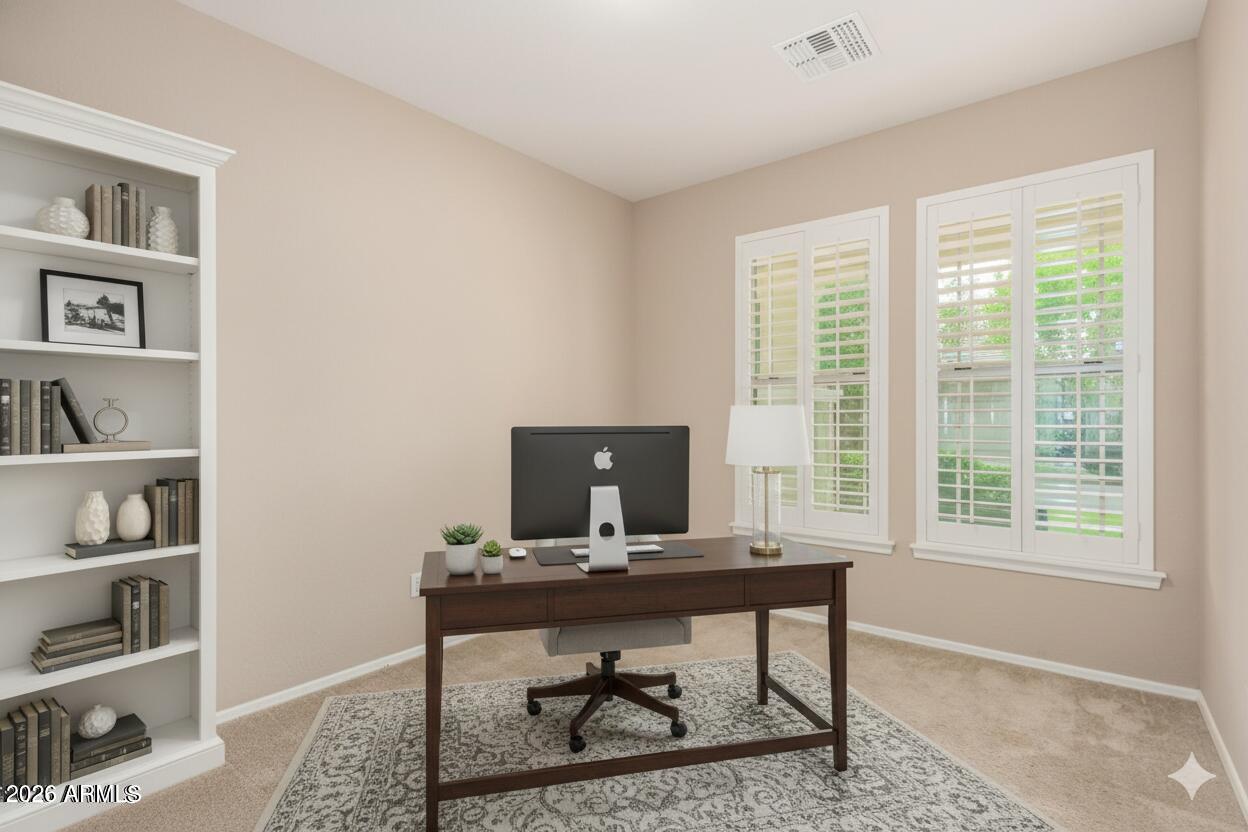 3540 East Mesquite Street Gilbert, AZ 85296 - Photo 8 of 55 a view of a workspace with furniture and a window