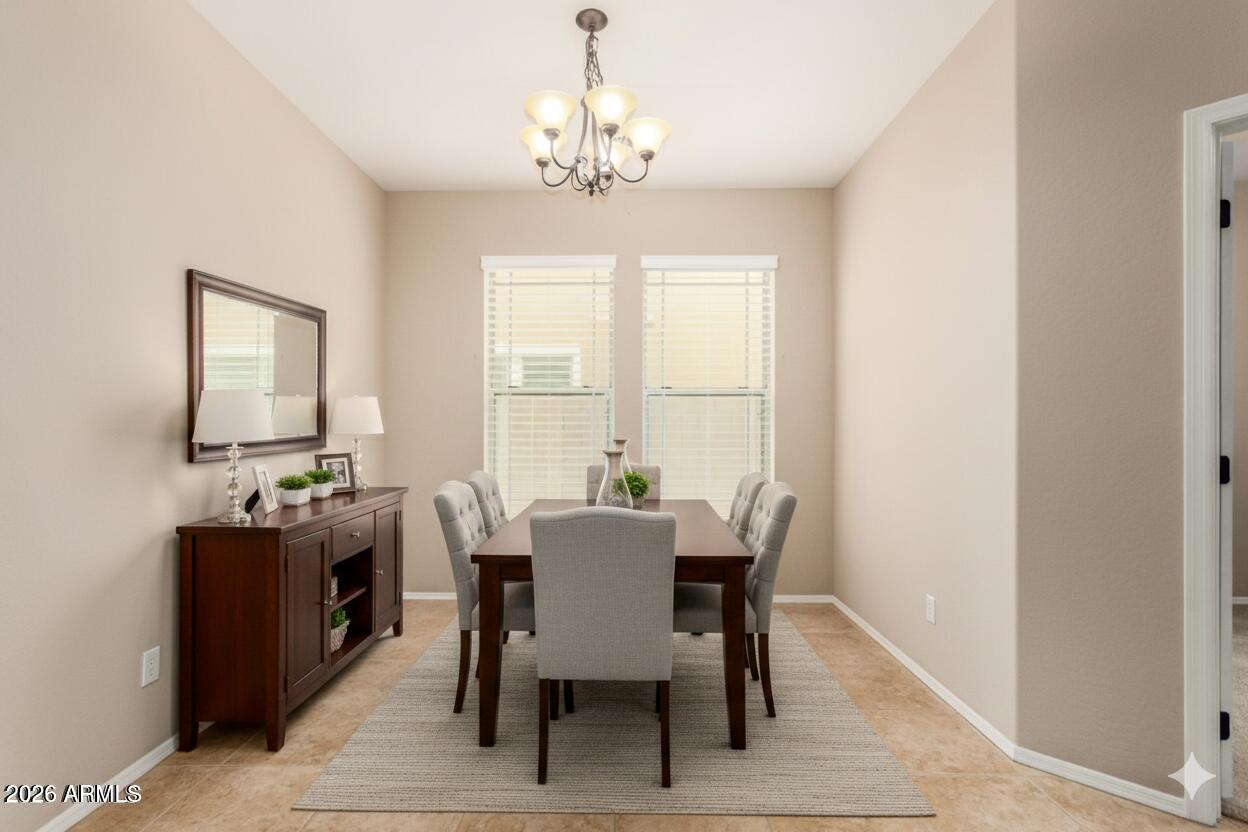 3540 East Mesquite Street Gilbert, AZ 85296 - Photo 10 of 55 a view of a dining room with furniture and window