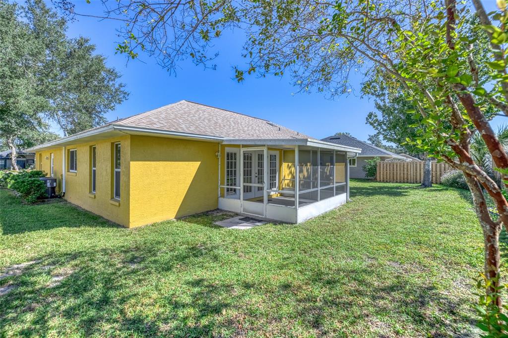 26 Marjorie Trail Ormond Beach, FL 32174 - Photo 22 of 30 a view of a house with backyard and garden