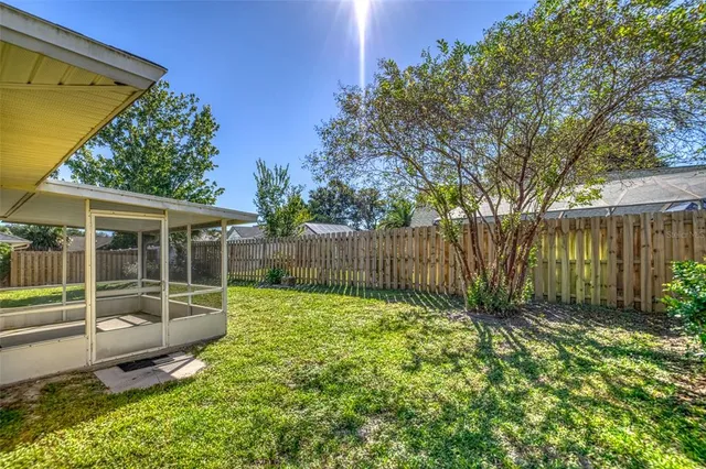 a view of a backyard with a small cabin